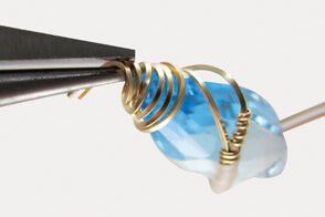 Wire wrapped around marquise pendant